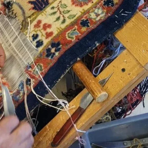 Retissage motifs tapis ancien